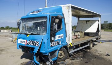 picture of truck after hitting a surface mounted safety barriers